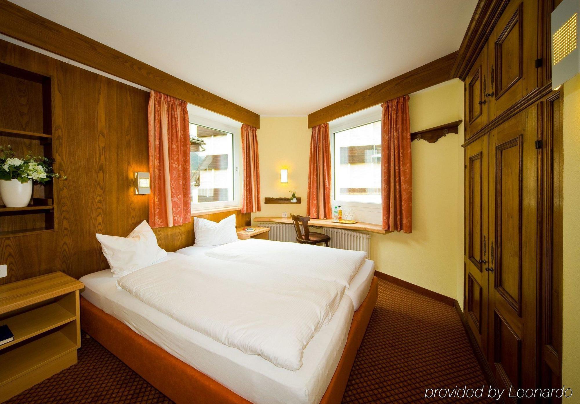 Le Petit Charme-Inn Zermatt Pokoj fotografie